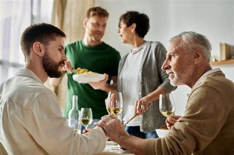 A Gay Couple Sits At A Stock Photo Image Of Connection
