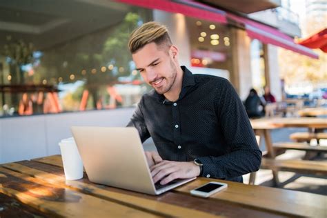 Premium Photo Businessman Working On His Laptop