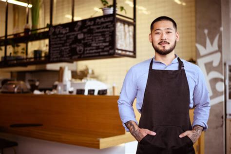 cafe owner asian images browse  stock  vectors