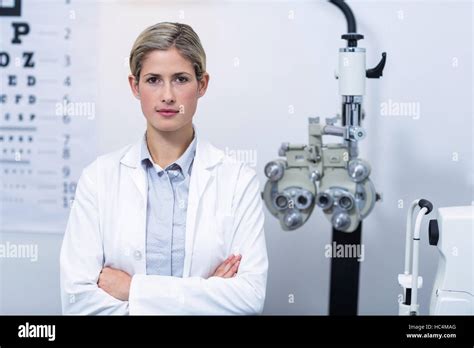 Female Optometrist Standing In Ophthalmology Clinic Stock Photo Alamy