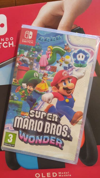 Nintendo Switch Rot Blau Mit Super Mario Bros Wonder Kaufen Auf Ricardo