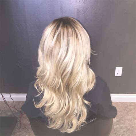 Icy Blonde With A Shadow Root Light Blonde Hair Icy Blonde Balayage