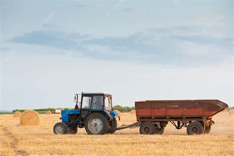 Premium Photo | Tractor at the field