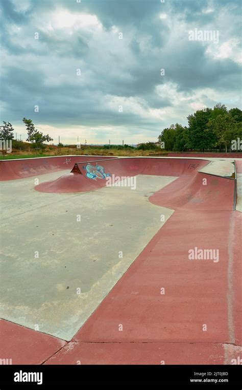 Concrete Skate Park Skate Park Empty With Trees Some Graffiti And