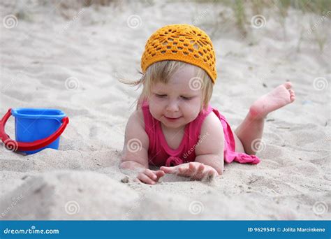 Baby on sand stock image. Image of happy, enjoying, beach - 9629549