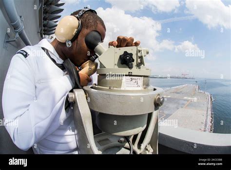 Seaman Uses An Alidade And Sound Powered Telephone Stock Photo Alamy