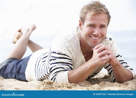 Man Relaxing On Beach Stock Photo Image Of Beach Sand 55897532