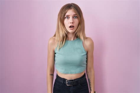 Free Photo Blonde Caucasian Woman Standing Over Pink Background