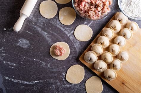 Premium Photo Homemade Dumplings From Minced Meat And Dough