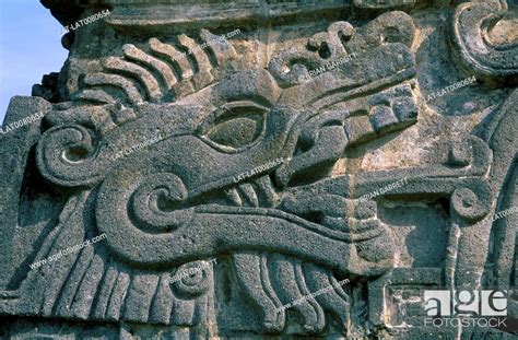 Archaeological site. Aztec Temple of Plumed Serpent. Close up of head ...