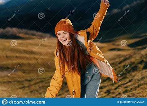 Woman Beautifully Running Up The Hill To The Camera Smile With Teeth In