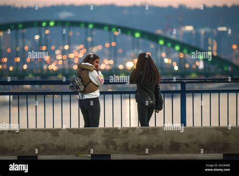 Belgrade Girls Talking In Brankov Most Bridge In The Evening With