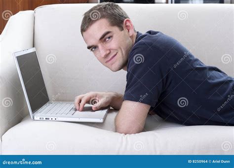 handsome laptop user stock photo image  close brightly