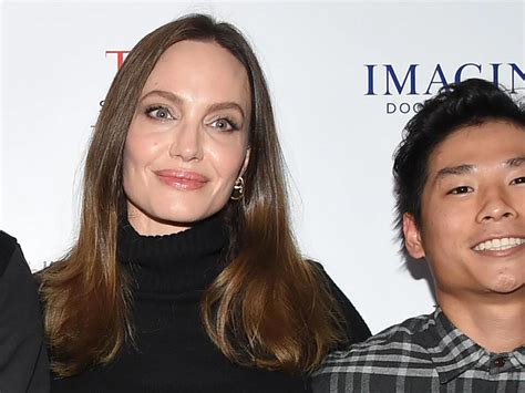 All Grown Up Angelina Jolie And Brad Pitts Son Pax Unveils Toned Abs