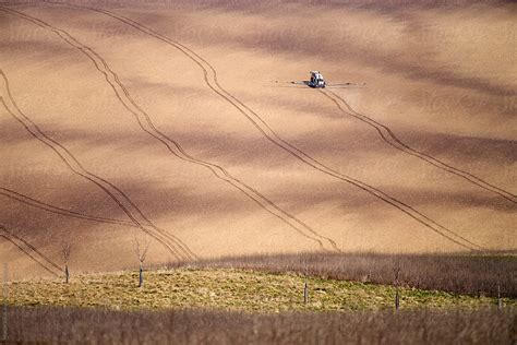 Spraying On Large Field By Stocksy Contributor Marcin Sobas Stocksy