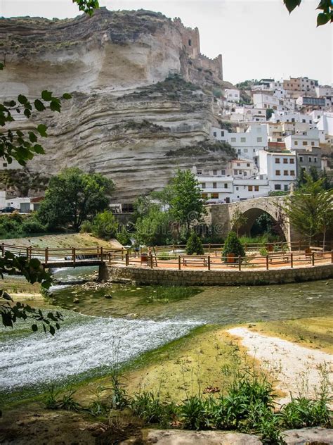 Cityscape with Bridge Over River at Alcala Del Jucar, Castilla L Stock ...