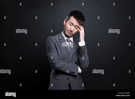 Chinese Businessman Thinking Stock Photo Alamy