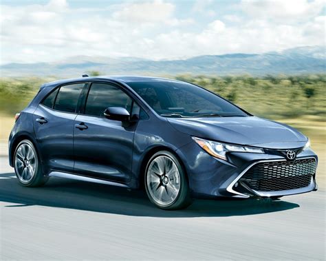 Side Front View Of Corolla Hatchback In Galactic Aqua Mica