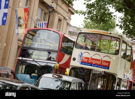 An "Original Tour" bus, and a London double decker bus, London, UK ...