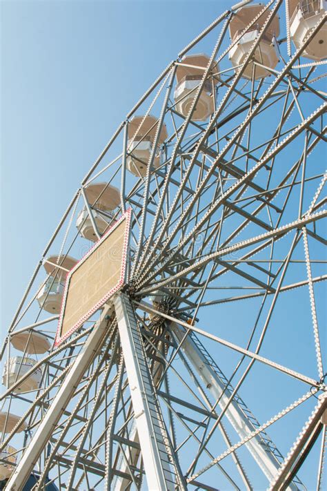 White Ferris Wheel Against Blue Sky Background Stock Image Image Of