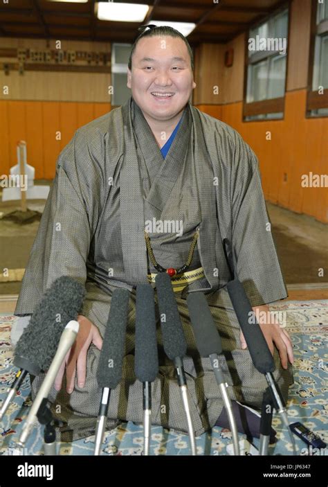 TOKYO, Japan - Mongolian yokozuna Hakuho attends a press conference at ...