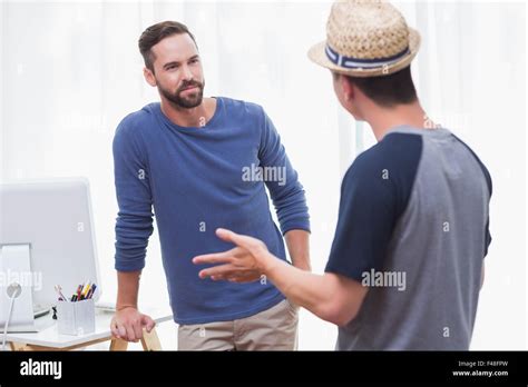 Casual Business People Speaking Together Stock Photo Alamy
