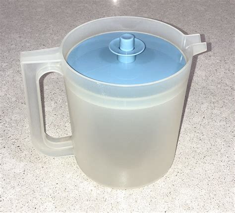 Tupperware Sheer Quart Drink Pitcher With Blue Push Button Seal