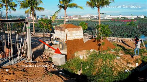 Bulldozer Pushing Sand Filling System Drainage And Truck Dumping Sand