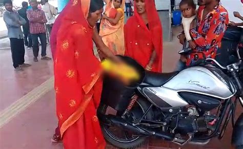 Denied Ambulance Madhya Pradesh Couple Carry Stillborn In Bike Side Box