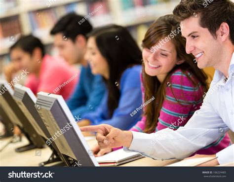 Group Of College Students In A Computer Lab Stock Photo 106224485