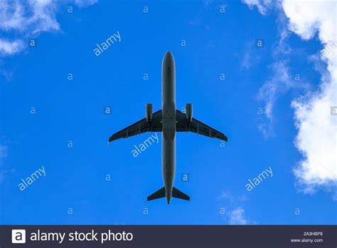 Airplane Blue Sky Clouds Hi Res Stock Photography And Images Alamy