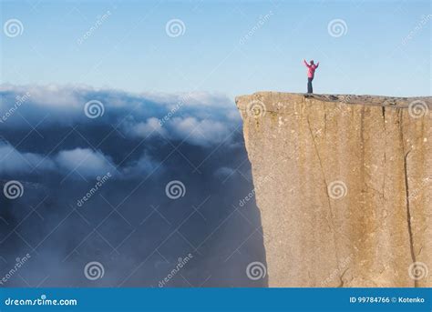 Girl On The Rock Preikestolen Norway Stock Photo Image Of Amazing