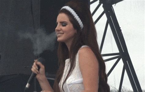 Lana Del Rey Smoking While Performing On Stage White Dress And Bouffant