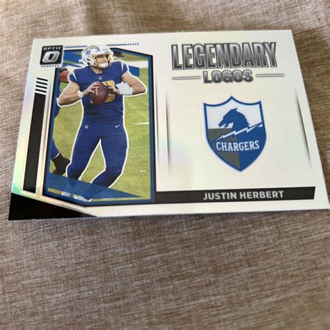 2021 Donruss Optic Legendary Logos LL 12 Justin Herbert Silver Chargers