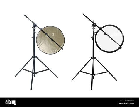 Tripods With Reflectors On White Background Professional Photographer