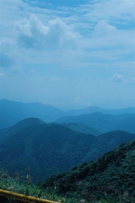 Stunning View Of Layered Mountain Ranges Covered With Dense Forests