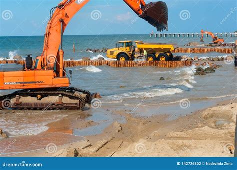 Construction of Breakwaters, Construction Equipment on the Sea Coast ...