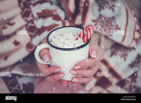 Hot Chocolate With Marshmallow In Woman Hand And Sweater Stock Photo Alamy