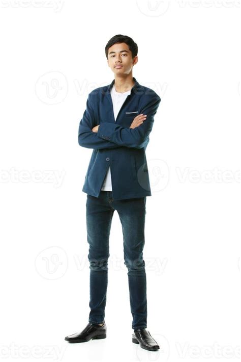 A full-body portrait of an early teenage boy. Smart, slim, tall Asian ...