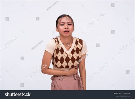 4 Women Clenching Her Stomach Pain Images Stock Photos And Vectors