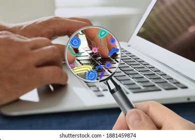 Man Magnifying Glass Detecting Microbes On Stock Photo