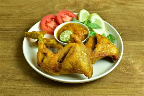 Pecel Ayam Fried Chicken With Sambal And Fresh Vegetables Stock Image Image Of Cuisine