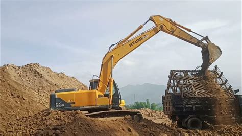 Hyundai Hx210s Excavator Loading Truck Youtube