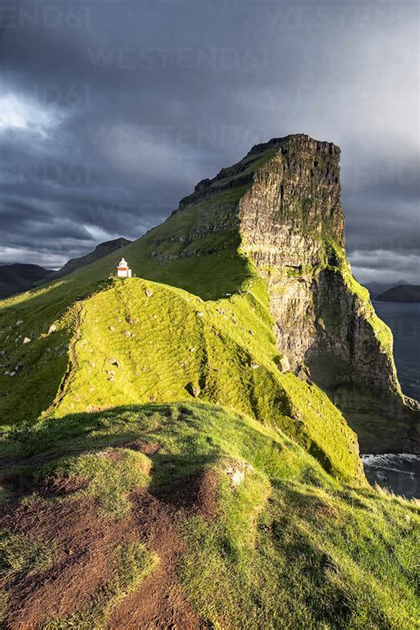 Sunset On Kallur Lighthouse On Kalsoy Island Faroe Islands Denmark