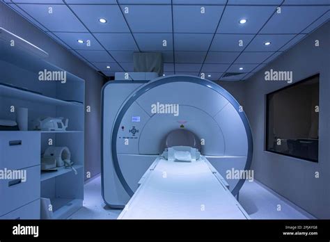 Modern Hospital Computed Tomography Room Interior With Device Computer