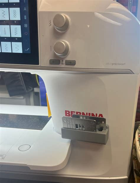 Bernina 990 Holds 2 stitch plates stick-on dual two needle plates Does