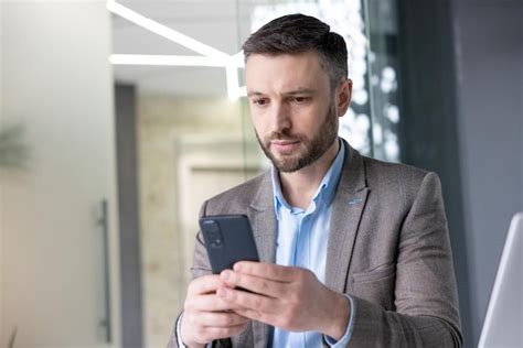Premium Photo Serious Concentrated Mature Businessman Thinking
