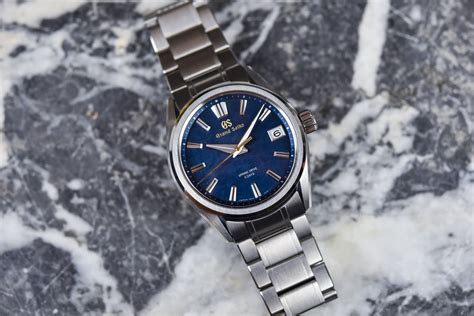 Hands On Review Grand Seiko Spring Drive Slga Lake Suwa Price