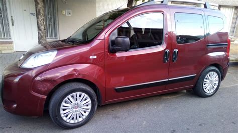 Juego De Tazas De Rueda Rodado Aplicables A Fiat Qubo Con Logo Ra