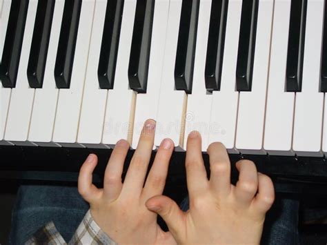 Child Playing Piano Close Up Of Keyboard And Hands Stock Photo Image